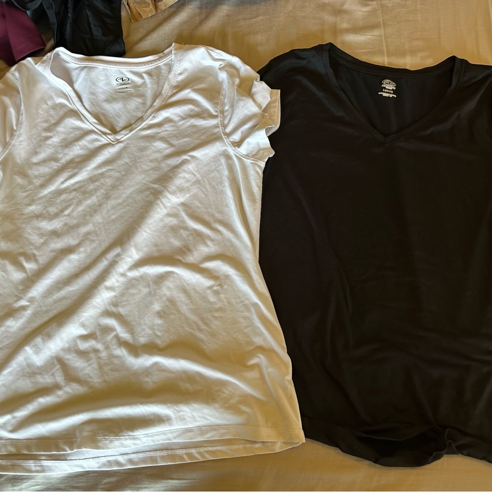Walmart brand workout shirts, size large. White and black.